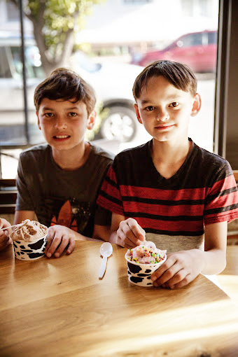 Two Kids Enjoying their Ice Cream at Rosie’s Ice Cream